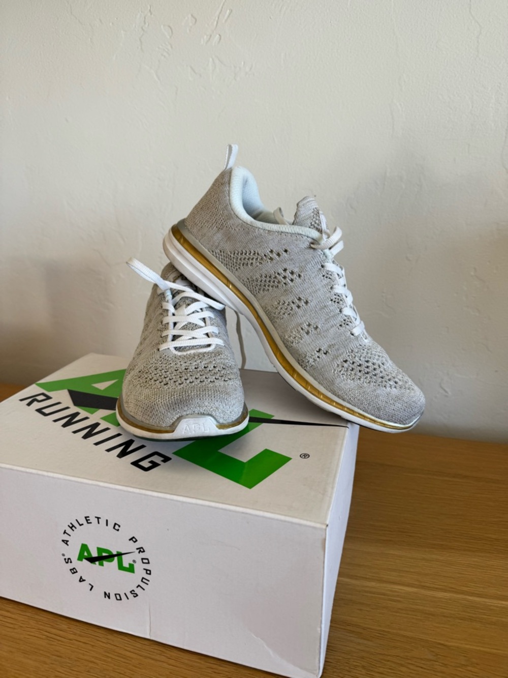 APL TechLoom Pro Knit Sneaker in White and Gold
